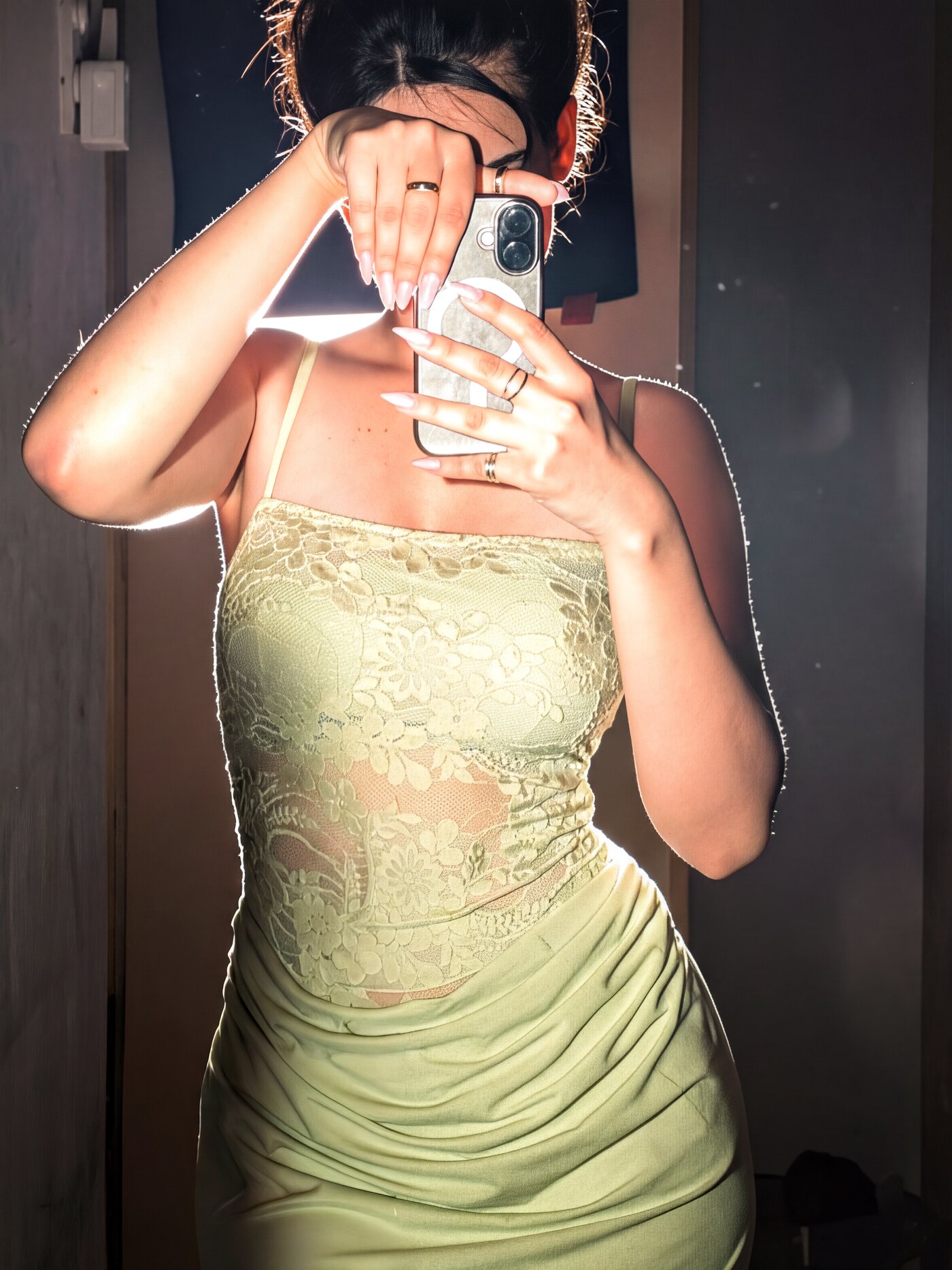 Sage-green bodycon dress, mirror portrait. "Ate. Maybe."